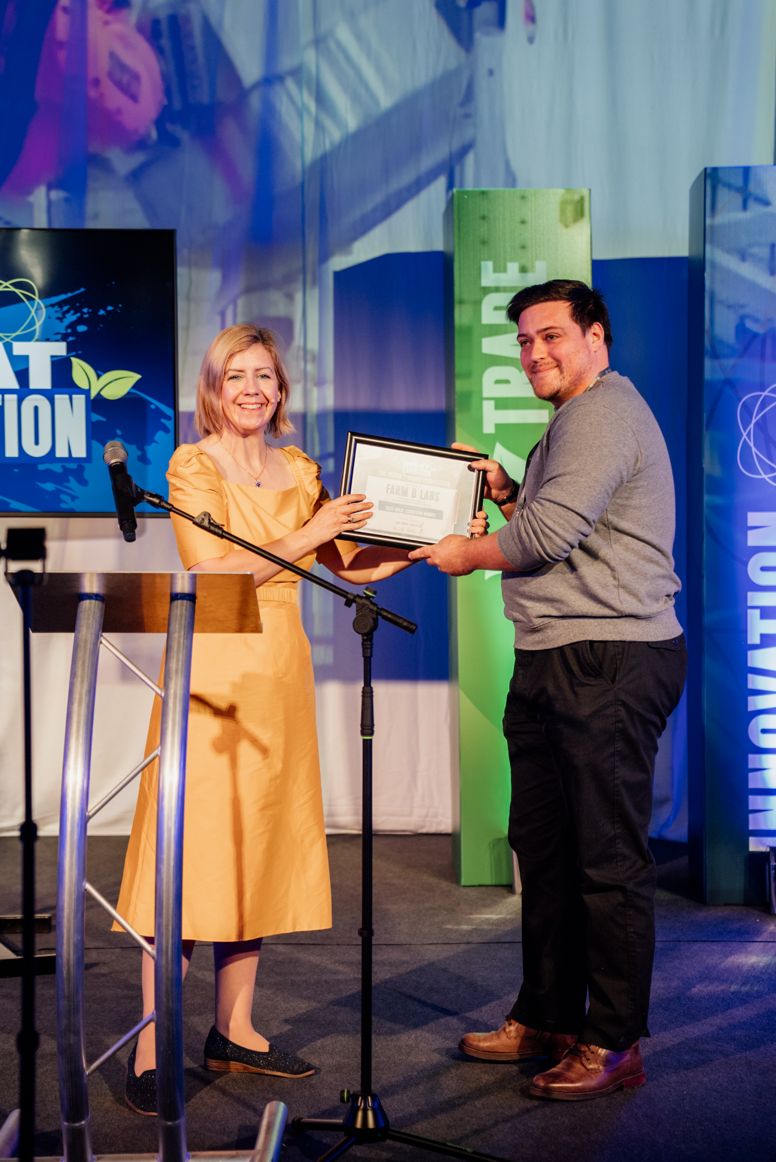 Winner presented with certificate.