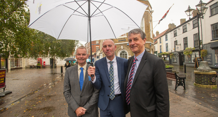 The Three current leaders of each council involved