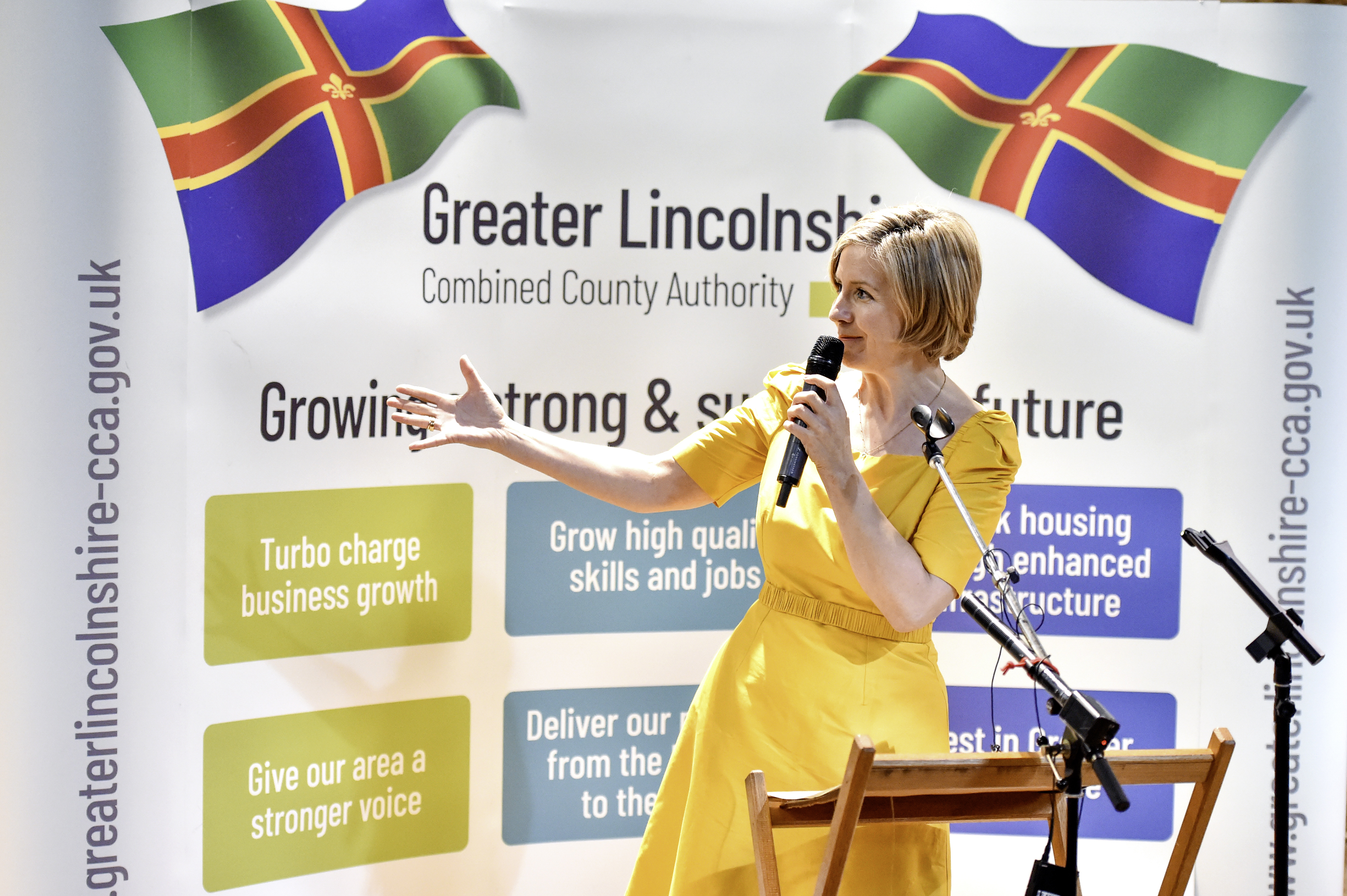 Andrea Jenkyns speaking on a podium